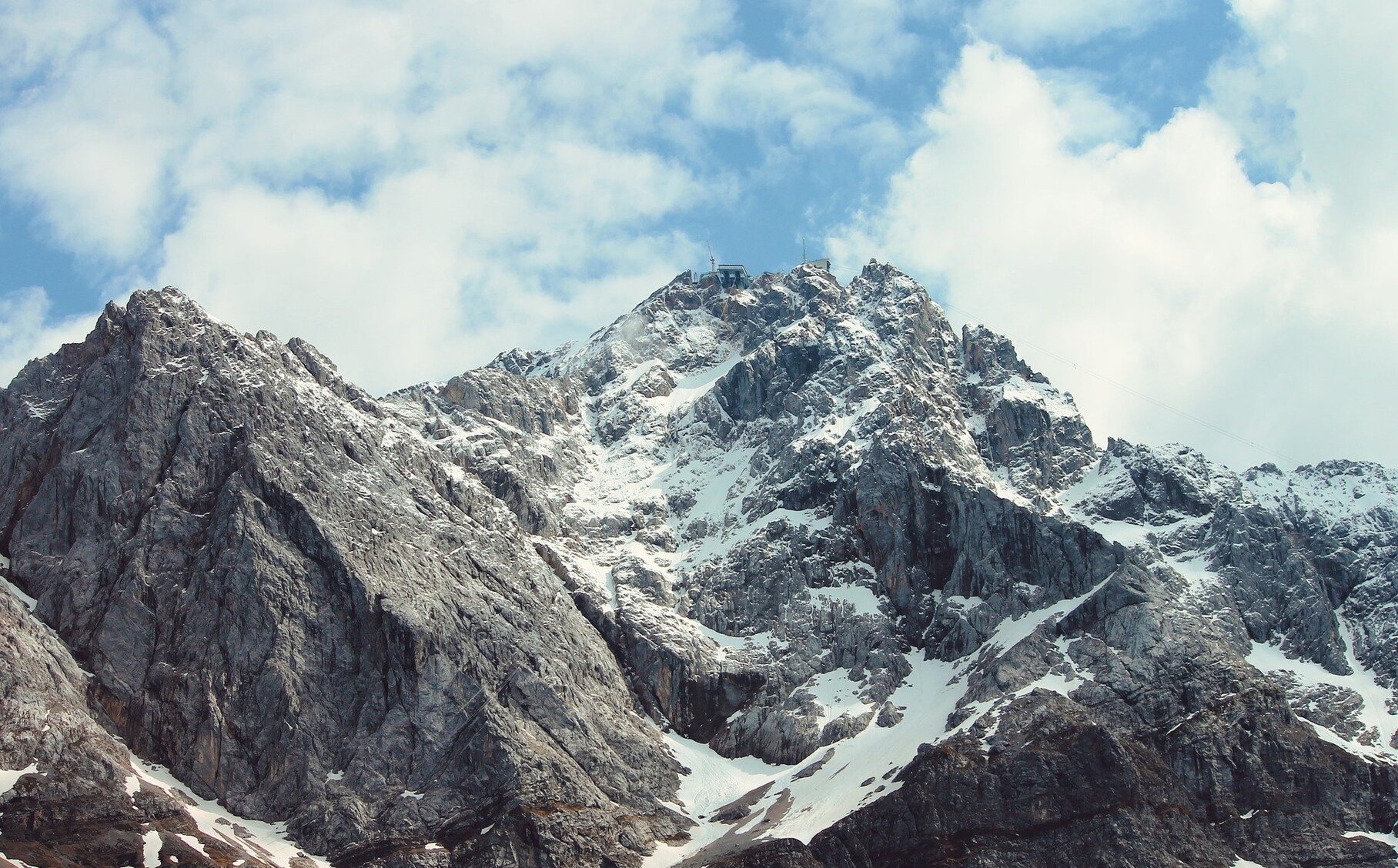 Die OZG-Umsetzung gleicht einer Kletterpartie entlang einer Bergkette.